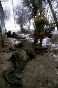 A woman grieves for ethnic Russian friends and neighbours who were mowed down by artillery attack. They had been standing in line at what they had heard was a distribution point for bread. Many Russian residents of Grozny had no relatives in rural Chechnya where they could take refuge during the bombing.