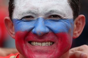 LILLE, FRANCE - JUNE 15, 2016: A Russian football fan with a painted face before a 2016 UEFA European Championship Group Stage football match between Russia and Slovakia at Stade Pierre Mauroy. Slovakia won 2-1. Alexander Demianchuk/TASS Ôðàíöèÿ. Ëèëëü.15 èþíÿ 2016. Áîëåëüùèê ñáîðíîé Ðîññèè ó ñòàäèîíà "Ïüåð-Ìîðóà" ïåðåä íà÷àëîì ìàò÷à ÷åìïèîíàòà Åâðîïû ïî ôóòáîëó - 2016 ìåæäó ñáîðíûìè êîìàíäàìè Ðîññèè è Ñëîâàêèè. Åãîð Àëååâ/ÒÀÑÑ